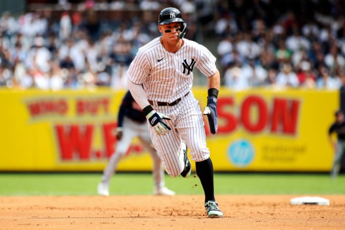 Sep 5, 2022; Bronx, New York, USA; New York Yankees center fielder Aaron Judge (99) runs home to score the first run of the game in the first inning against the Minnesota Twins at Yankee Stadium.